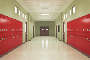 a school hallway painted green with red lockers